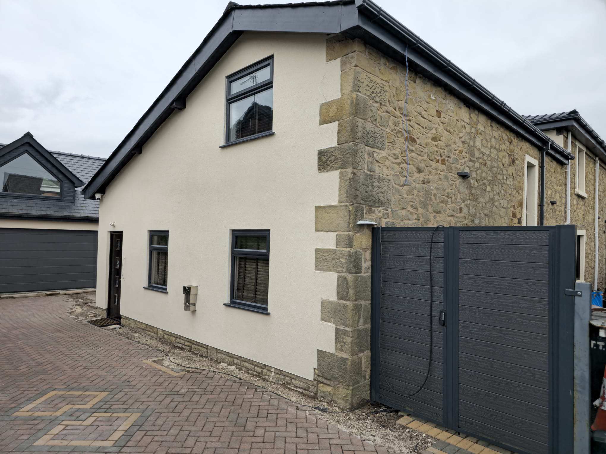 External wall upgrade on a rendered home near Preston